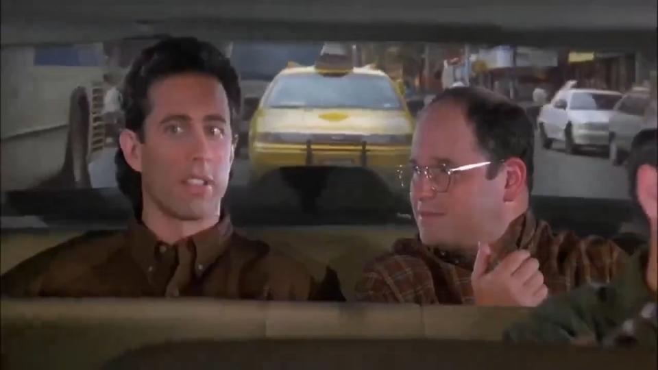 Jerry and George in a taxi in "Seinfeld"