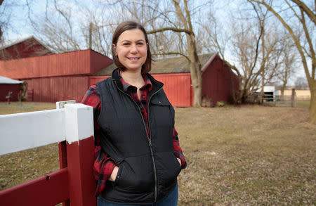 Democratic candidate for Michigan's 8th Congressional District Elissa Slotkin, a former Defense Department official and intelligence analyst, poses for a picture on her family farm in Holly, Michigan, U.S., April 12, 2018. Picture taken April 12, 2018. REUTERS/Rebecca Cook