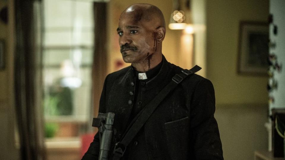 Father gabriel stands with a bloody face the walking dead finale survivor who survived