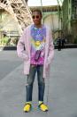 <p>The smooth man that is Pharrell donned a Chanel cardigan and acidic tee.<br><i>[Photo: Getty]</i> </p>