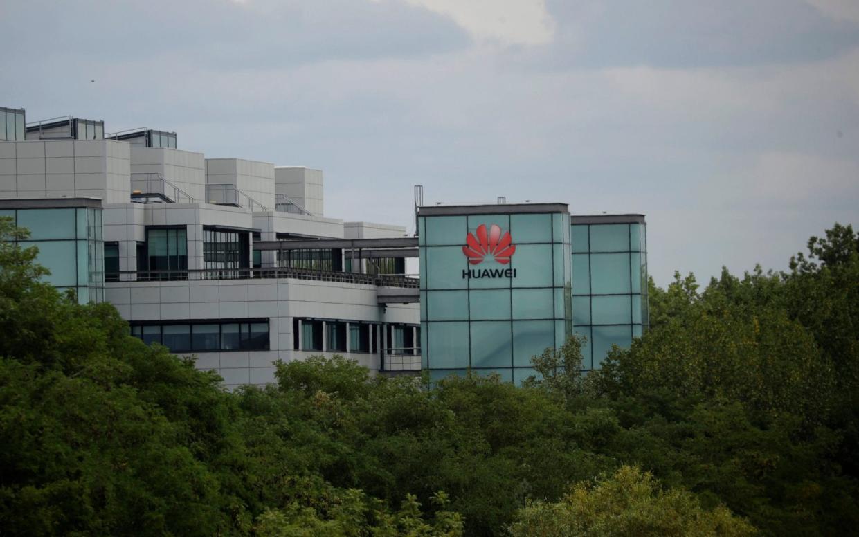 A Huawei sign is displayed on their premises in Reading, England, Tuesday, July 14, 2020. Britain's government on Tuesday backtracked on plans to give Chinese telecommunications company Huawei a limited role in the U.K.'s new high-speed mobile phone network in a decision with broad implications for relations between London and Beijing. (AP Photo/Matt Dunham) - Matt Dunham/AP Photo