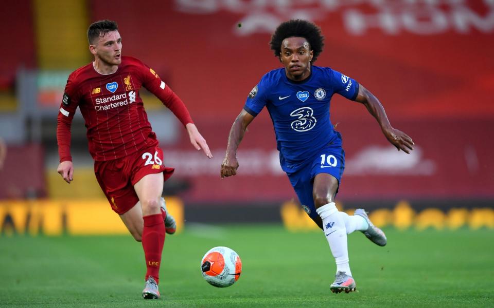 Willian sprints by Liverpool's Andrew Robertson - PA