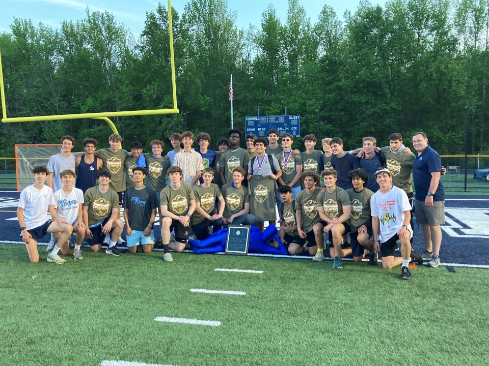 The CBA boys track team poses after winning the 2023 Monmouth County title