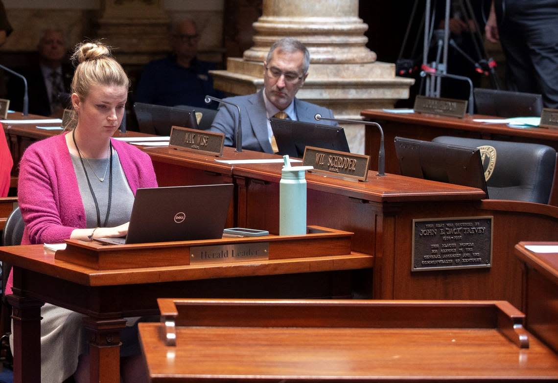 Lexington Herald-Leader Frankfort bureau chief Tessa Duvall at her desk on the floor of the Senate Chambers in the State Capitol in Frankfort, Ky.