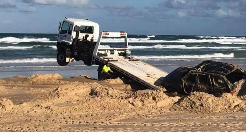 It took some time before the car could be removed from the sand. Source: Facebook/I got bogged at Inskip Point