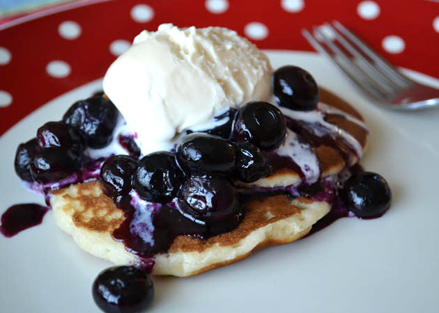 <b>Blueberries and honey with vanilla ice cream</b><br> Cook or warm your pancakes and put to one side. In a small frying pan, tip in a handful of blueberries along with a small splash of water and put on a medium heat. When the berries begin to sizzle and pop, drizzle over a tablespoon of runny honey. Squash a couple of the berries, and as you stir, a sticky, dark purple sauce will start to develop. This just takes about a minute. Spoon over your pancakes and top with a scoop of good-quality vanilla ice cream.