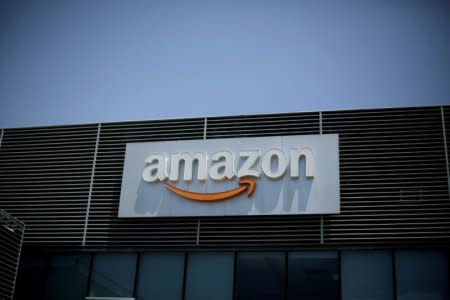 FILE PHOTO: The logo of Amazon is seen on a building in San Jose, Costa Rica March 21, 2018. REUTERS/Juan Carlos Ulate