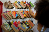 Ivory coast fashion designer Liliane Estievenart, 45, shows her bags inside her workshop in Abidjan, Ivory Coast July 22, 2017. REUTERS/Thierry Gouegnon