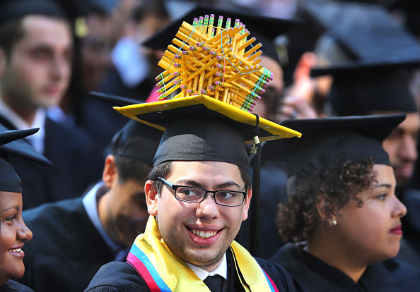 CAMBRIDGE, MA -Massachusetts Institute of Technology Graduate student Nicolas Gomez, who received a degree in civil engineering, wears a pencil sphere on his cap during the MIT commencement at Killian Court on the MIT campus (John Tlumacki/The Boston Globe via Getty Images)