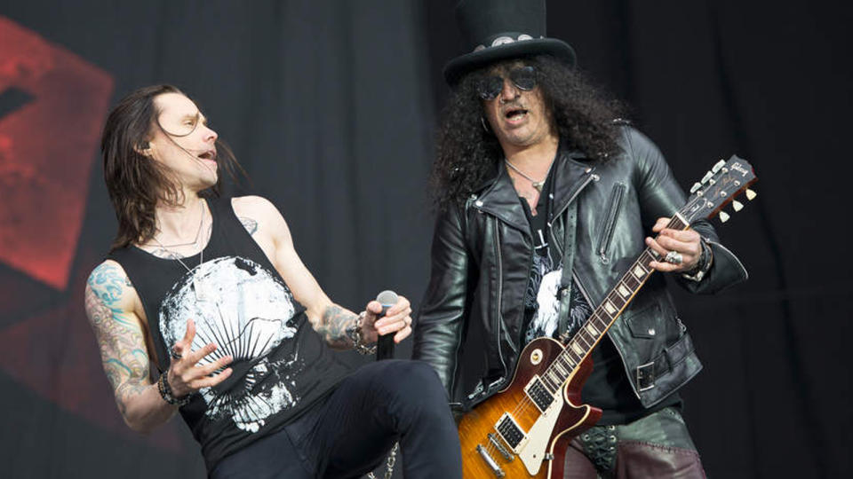 Slash and Myles Kenney on stage