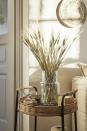 <p>Bridge the gap between the indoors and outdoors with <a href="https://www.housebeautiful.com/uk/decorate/display/a35418217/dried-flowers/" rel="nofollow noopener" target="_blank" data-ylk="slk:dried flowers;elm:context_link;itc:0;sec:content-canvas" class="link ">dried flowers</a>, natural grasses and statement plants.</p><p>'Nature also has a relaxing influence on the mind, so incorporating houseplants like the <a href="https://www.housebeautiful.com/uk/garden/plants/a38915247/swiss-cheese-plant/" rel="nofollow noopener" target="_blank" data-ylk="slk:Monstera Deliciosa;elm:context_link;itc:0;sec:content-canvas" class="link ">Monstera Deliciosa</a> will draw on those vibrant natural colours and help to create a positive environment.'</p>