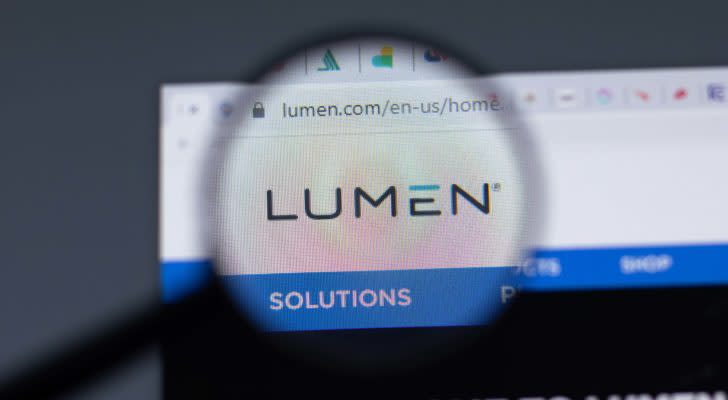 A magnifying glass zooms in on the website for Lumen Technologies (LUMN).