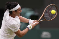 Tunisia's Ons Jabeur returns to Aryna Sabalenka of Belarus in a women's singles semifinal match on day eleven of the Wimbledon tennis championships in London, Thursday, July 13, 2023. (AP Photo/Alberto Pezzali)