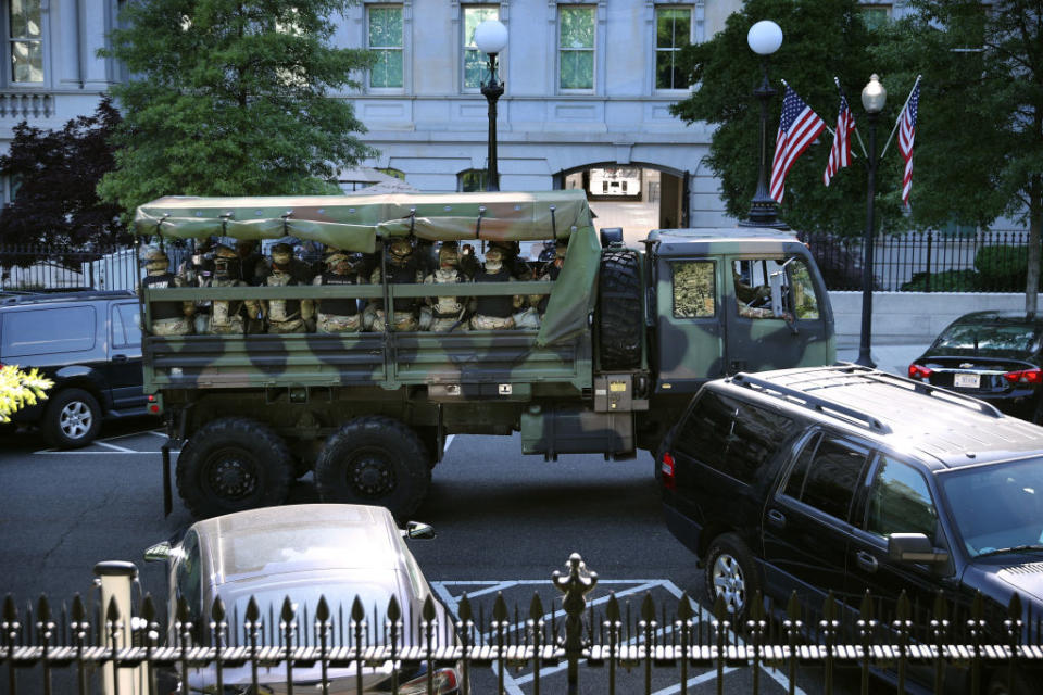 Trucks transport District of Columbia National Guard troops in Washington. Source: Getty