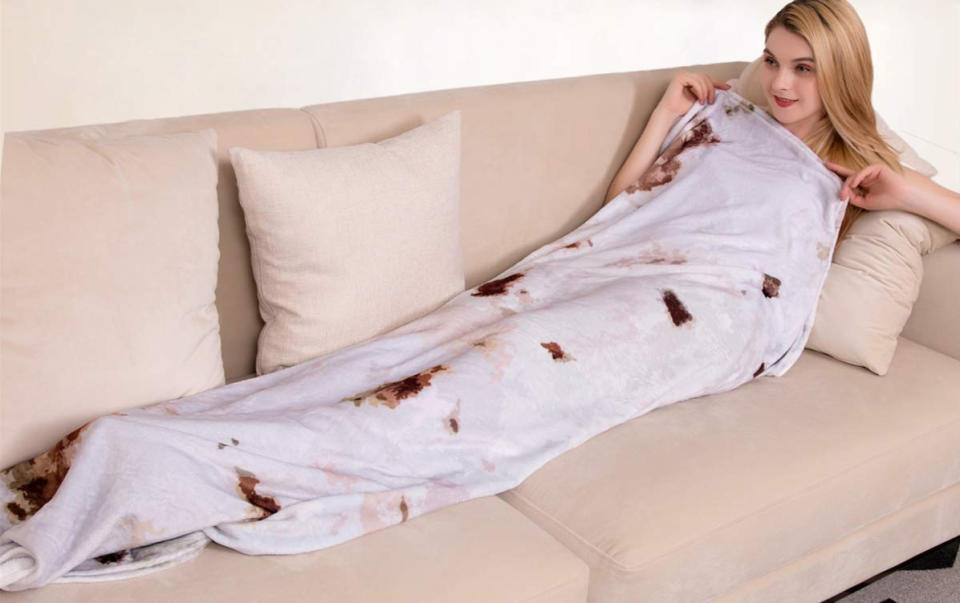 a woman wrapped in the Jorbest Burritos Tortilla Blanket