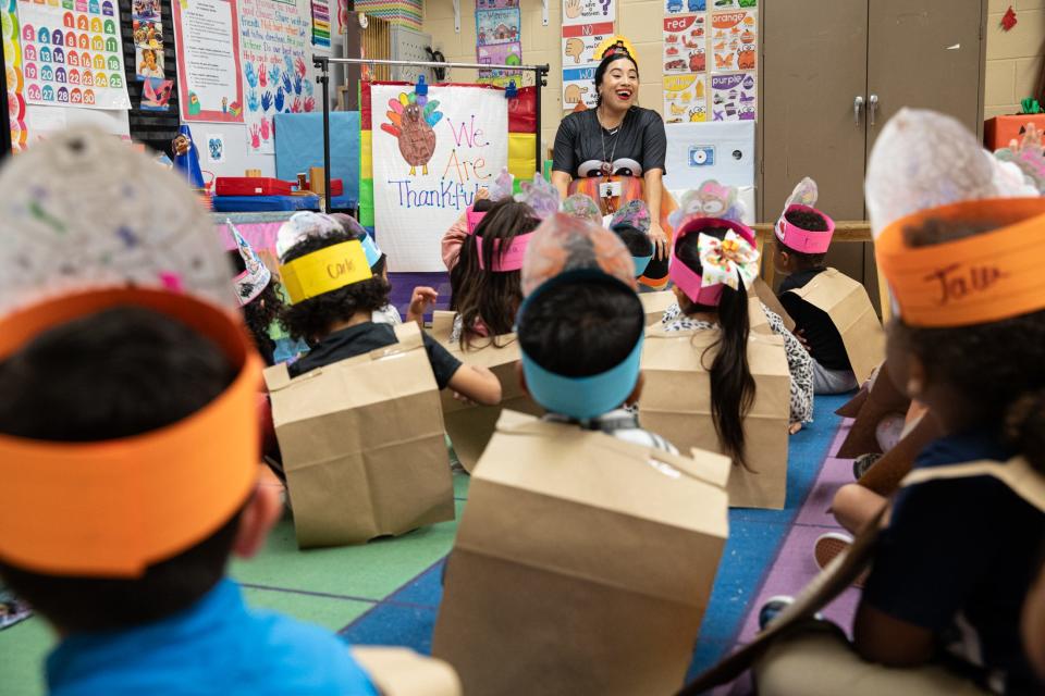 Pre-k teacher Melissa Guerra asks students what they are thankful for during Friendsgiving at Sam Houston Elementary on Thursday, Nov. 16, 2023, in Corpus Christi, Texas.