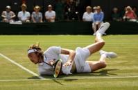 Tennis - Wimbledon - All England Lawn Tennis and Croquet Club, London, Britain - July 9, 2018 Greece's Stefanos Tsitsipas in action during the fourth round match against John Isner of the U.S. REUTERS/Tony O'Brien