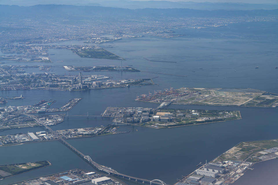 An aerial photo shows some of the inlets, wharves and reclaimed islands of Japan's Osaka Bay. / Credit: Taro Hama/Getty