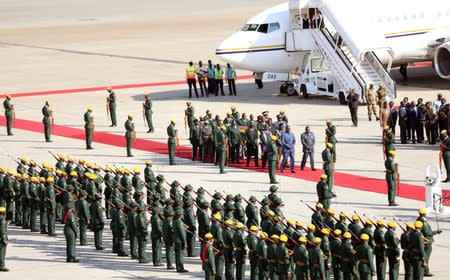 The body of former Zimbabwean President Robert Mugabe arrives back in Harare