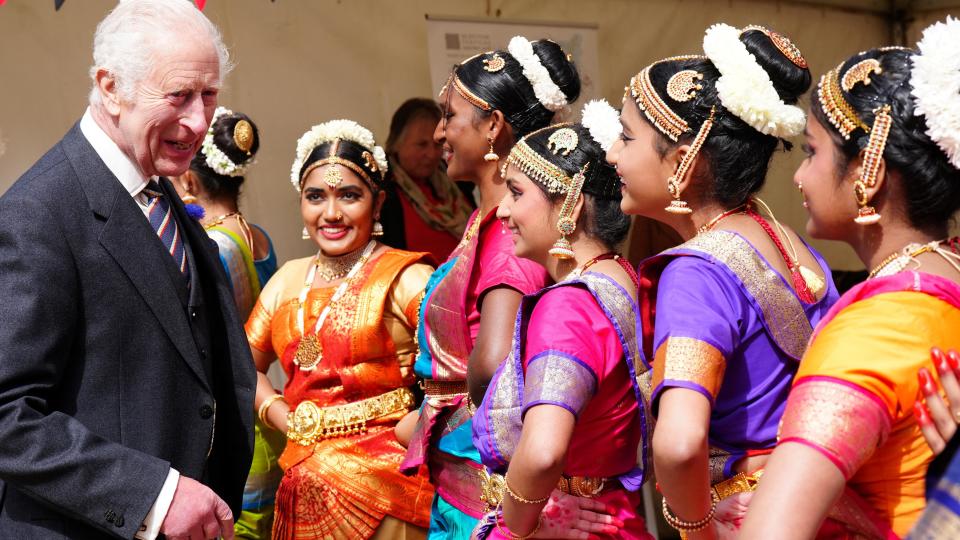  King Charles speaks to performers at a celebration at Edinburgh Castle to mark the 900th Anniversary of the City of Edinburgh