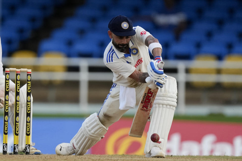 India's Virat Kohli plays a shot from the bowling of West Indies' Jomel Warrican on day one of their second cricket Test match at Queen's Park in Port of Spain, Trinidad and Tobago, Thursday, July 20, 2023. (AP Photo/Ricardo Mazalan)