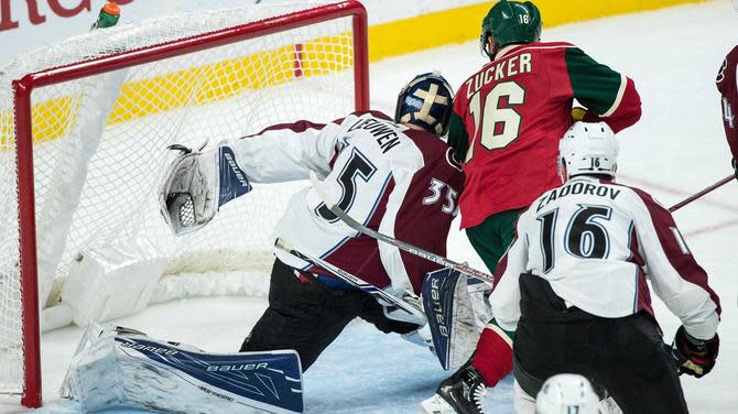 Sep 27, 2016; Saint Paul, MN, USA; Colorado Avalanche goalie Nathan Lieuwan (35) makes a save in front of Minnesota Wild forward Jason Zucker (16) during the third period of a preseason hockey game at Xcel Energy Center. The Avalanche defeated the Wild 4-1. Mandatory Credit: Brace Hemmelgarn-USA TODAY Sports