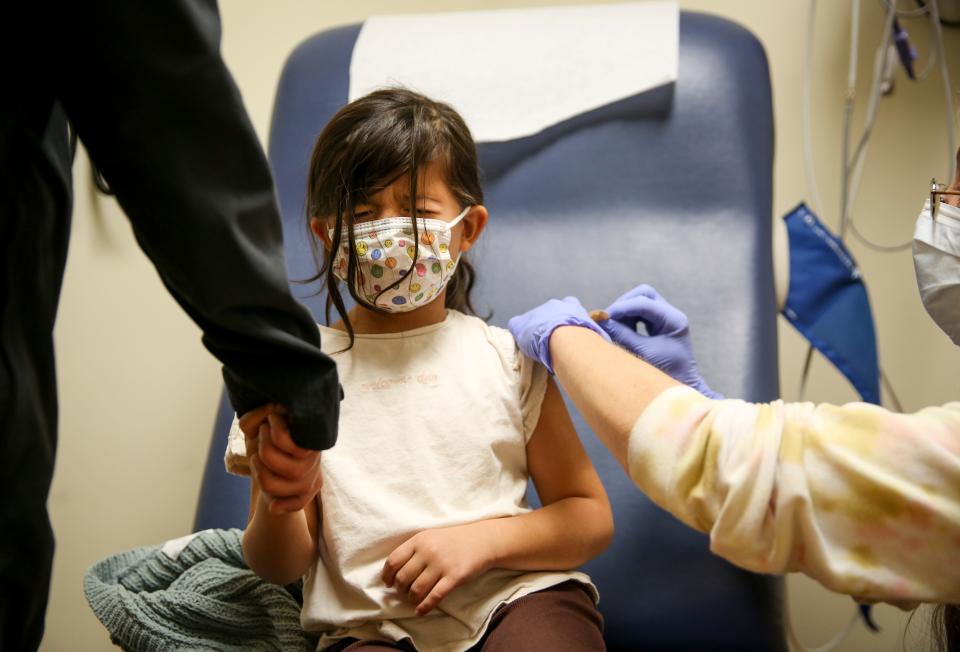 Rose Lopez, 5, receives the Pfizer COVID-19 vaccine on Nov. 19, 2021, in Salem, Ore. The vaccine recently was approved for children ages 5 to 11 years old.