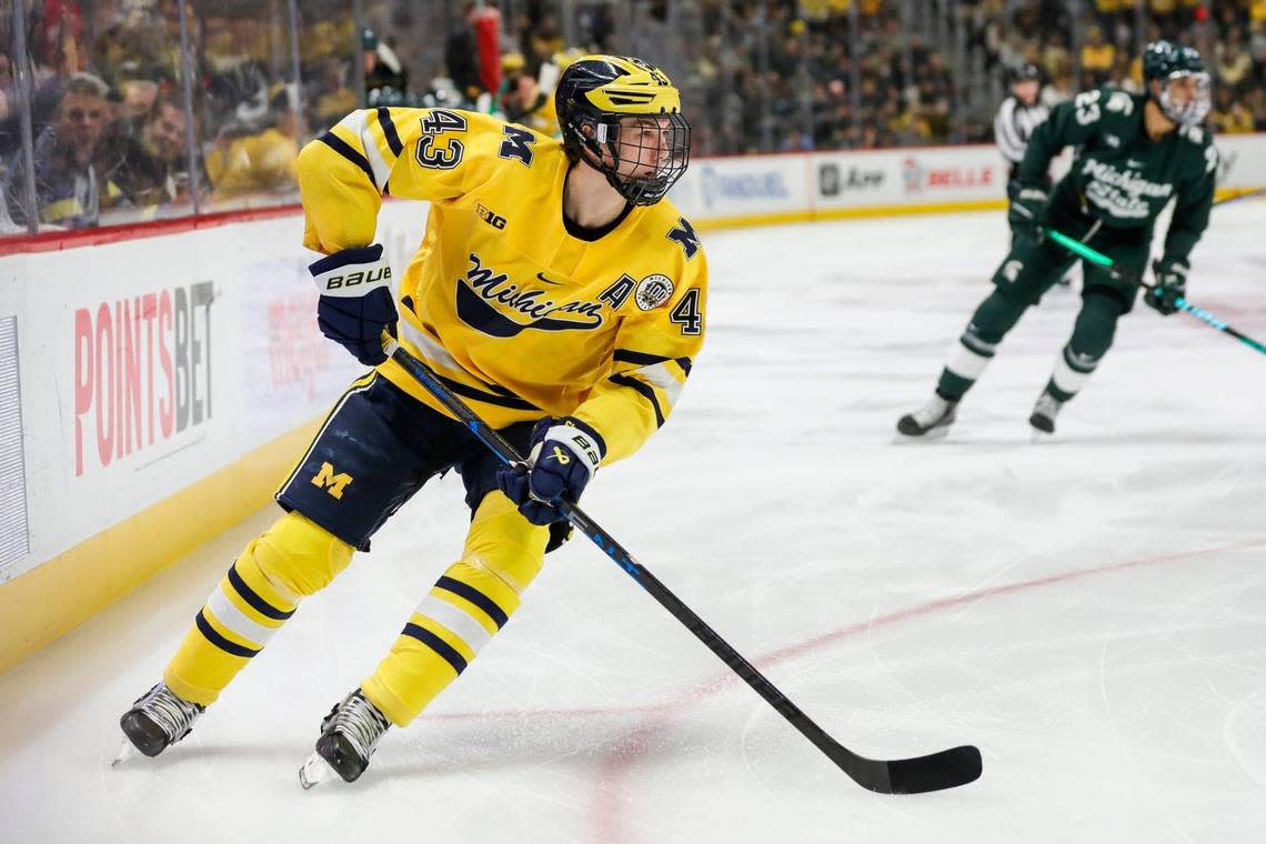 Michigan forward Gavin Brindley (4) looks to pass against Michigan State during the first period of Duel in the D at Little Caesars Arena in Detroit on Saturday, February 11, 2023. Junfu Han/USA TODAY NETWORK