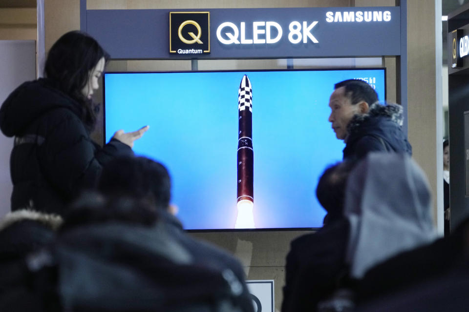 A TV screen shows an image of North Korea's missile launch during a news program at the Seoul Railway Station in Seoul, South Korea, Tuesday, Dec. 19, 2023. North Korean leader Kim Jong Un threatened "more offensive actions" to repel what he called increasing U.S.-led military threats after he supervised the third test of his country's most advanced missile designed to strike the mainland U.S., state media reported Tuesday. (AP Photo/Ahn Young-joon)