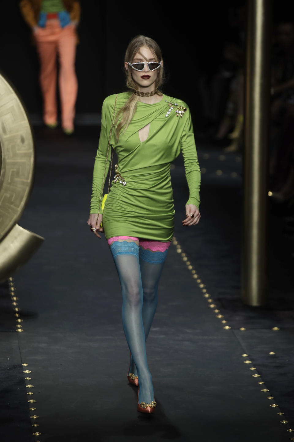 A model wears a creation as part of the Versace women's Fall-Winter 2019-2020 collection, that was presented in Milan, Italy, Friday, Feb. 22, 2019. (AP Photo/Luca Bruno)