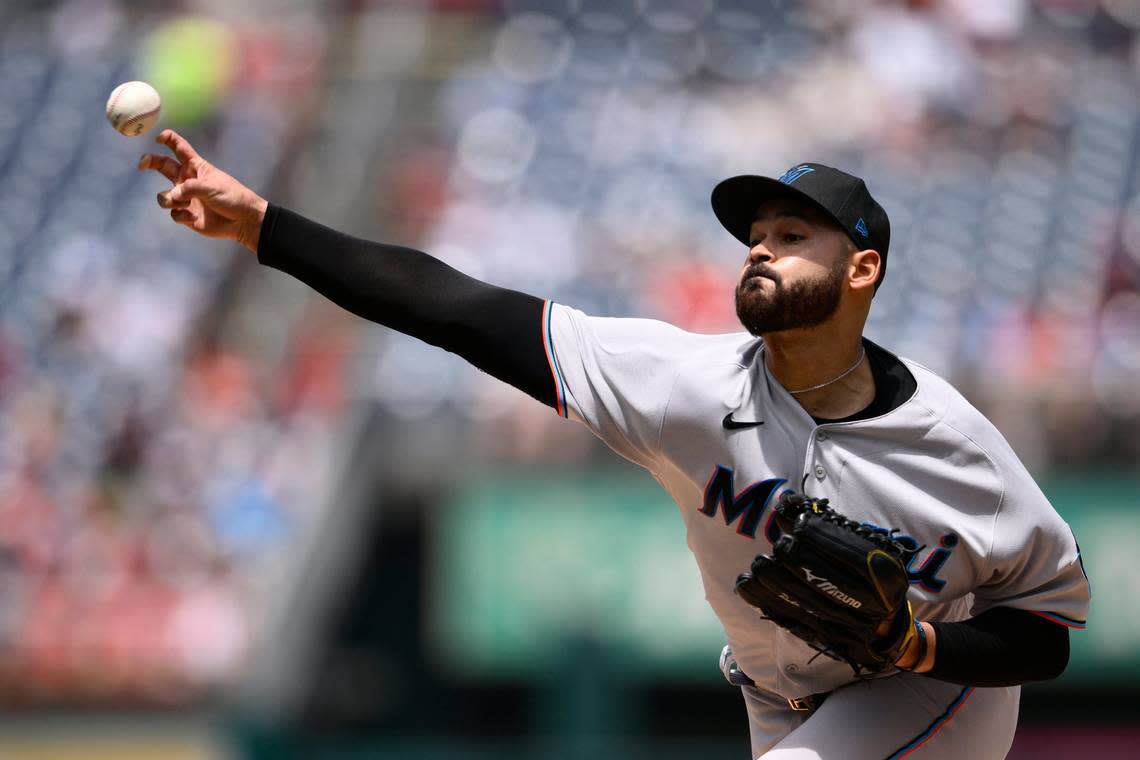 Miami Marlins starting pitcher Pablo Lopez throws during the first inning of a baseball game against the Washington Nationals, Sunday, July 3, 2022, in Washington. (AP Photo/Nick Wass)
