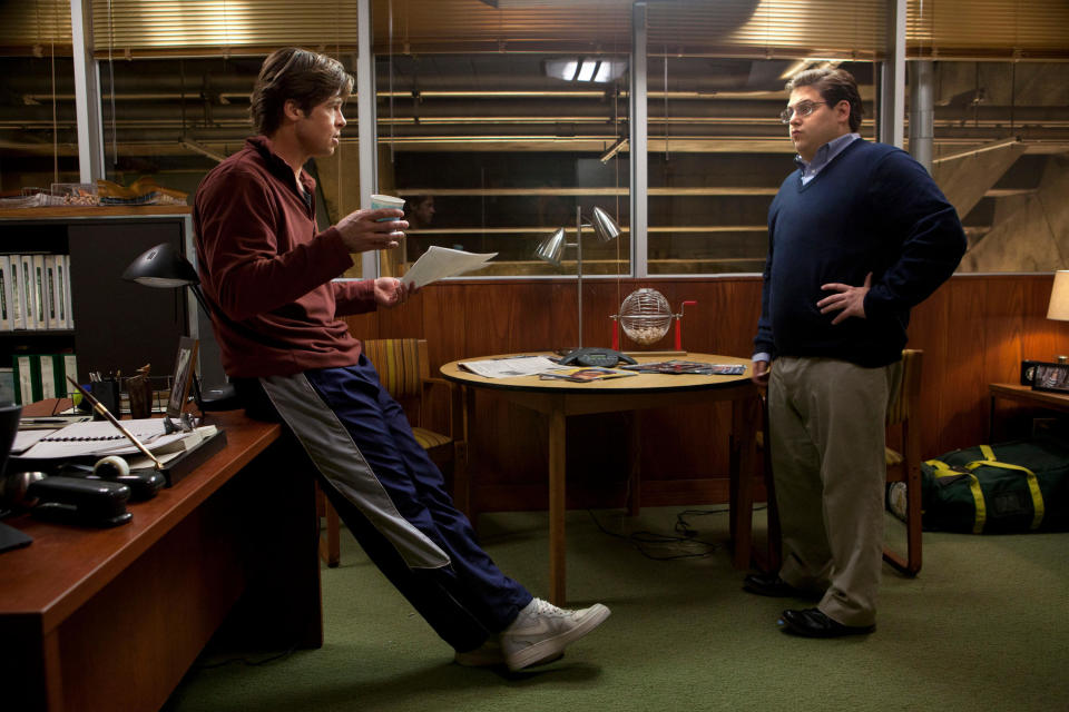 Brad Pitt and Jonah Hill discuss their options in "Moneyball"