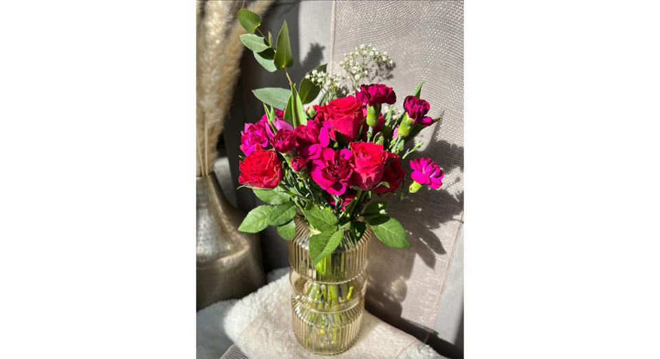 This rose and carnation mix will brighten up your home in an instant. 