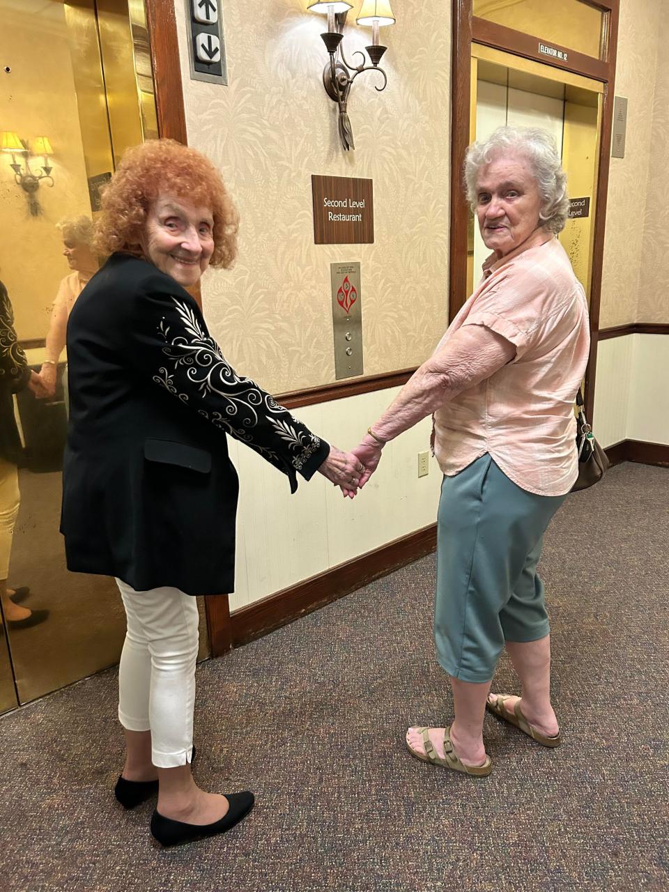 Barbara Carolan, 94, recently flew across the country to reunite with her 91-year-old sister Shirley. Carolan's granddaughter captured the reunion on video and it has since gone viral.