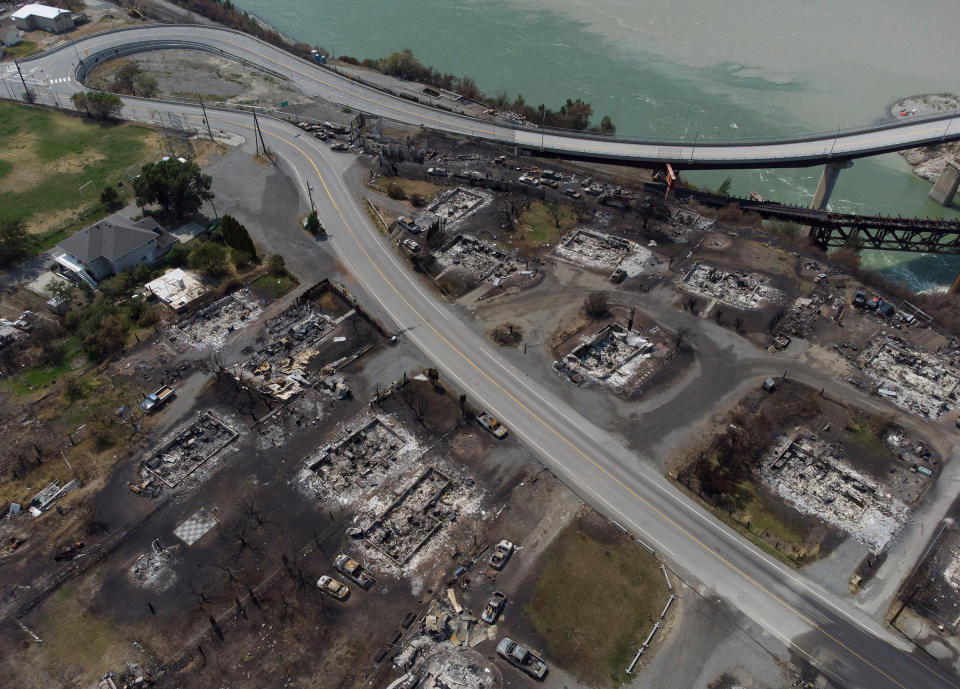 In this photo taken by a drone, damaged structures are seen in Lytton, British Columbia, Canada on July 9, after a wildfire destroyed most of the village on June 30.<span class="copyright">Darryl Dyck—The Canadian Press/AP</span>