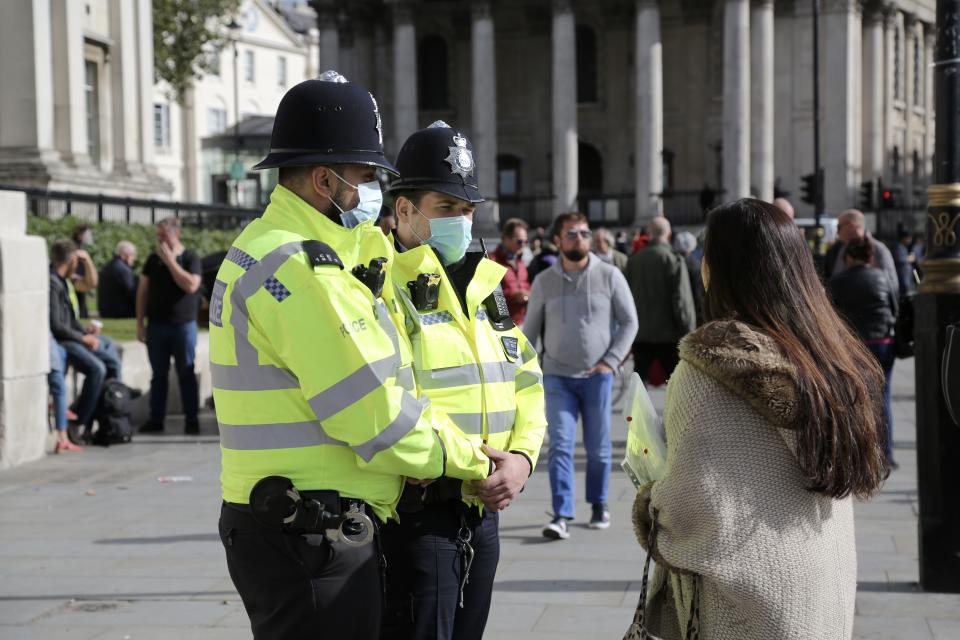 LONDON, UNITED KINGDOM - SEPTEMBER 26: Members of StandUpX, a community of people protesting vaccination and coronavirus (Covid-19) measures, gather at Trafalgar Square during a mass rally against wearing mask, taking test and government restrictions imposed to fight the spread of coronavirus (Covid-19) pandemic, in London, United Kingdom on September 26, 2020. (Photo by Hasan Esen/Anadolu Agency via Getty Images)