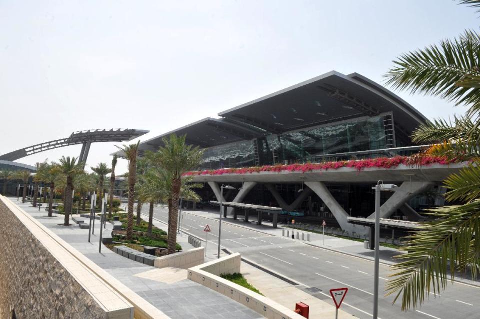 A general view of the empty main terminal building of the Hamad International Airport (HIA) which opened on Wednesday, April 30, 2014, in Doha, Qatar. The massive new airport in the Qatari capital has started handling its first commercial flights after years of delays as the natural-gas rich Gulf nation works to transform itself into a major aviation hub. (AP Photo/Osama Faisal)