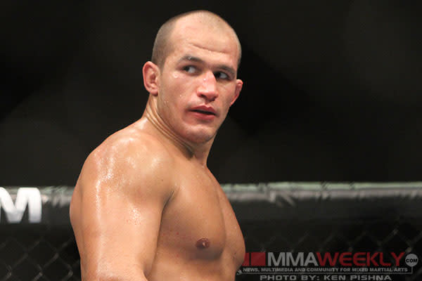 Junior dos Santos looks on during a fight. (MMAWeekly)
