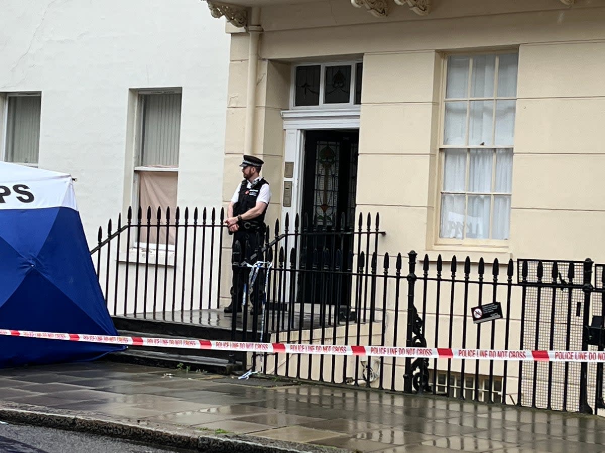 Police officer guards the scene after a baby was found dead (Oliver Castle)