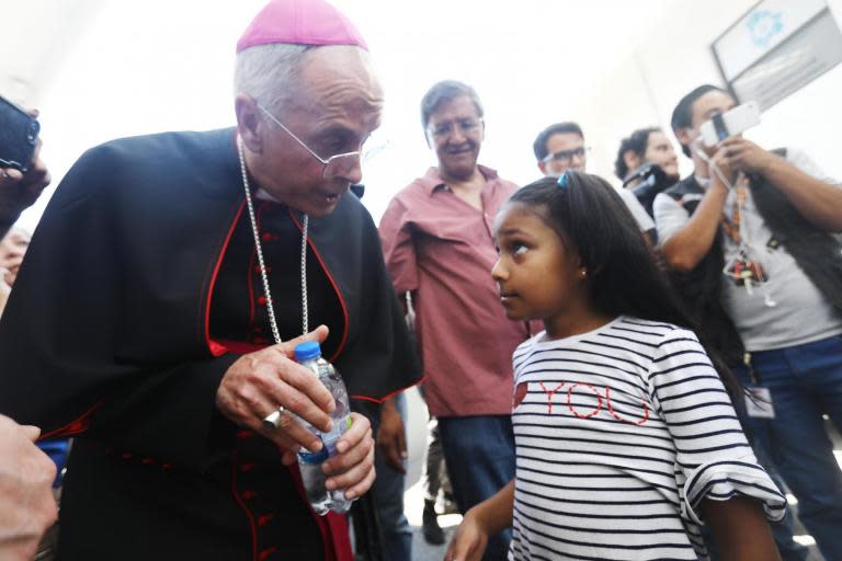 A Texas bishop walked with Central American migrants across and US-Mexico border bridge in protest of conditions asylum seekers face under the Trump Administration. Mark J Seitz, a Roman Catholic bishop, walked across the Lerdo International Bridge in El Paso with migrants as part of his “Faith Action” protest. The bishop, who is originally from Wisconsin, prayed with and walked a Honduran family of five across the border bridge as they went to make an asylum claim with US Customs and Border Protection (CBP), reports the Dallas Morning News.Bishop Seitz’s protest opposes the Trump Administration’s immigration policy, specifically the Migrant Protection Protocols. The Migrant Protection Protocols require migrants who seek asylum by crossing the El Paso bridge to return to Mexico as they wait for border agents to process their claims. The waiting period for asylum seekers can last from weeks to months.The Dallas Morning News reports that over 15,000 migrants have been sent back to Mexico from the US as their asylum claims are reviewed. Anywhere from 100 to 200 migrants are sent back to Mexico daily.“As a Catholic and Christian leader on the border, I am often called to be a doctor of the soul,” said Bishop Seitz to reporters in both Spanish and English.He continued: “Standing here at the U.S.-Mexico border, how do we begin to diagnose the soul of our country?”“A government and society which view fleeing children and families as threats. A government which treats children in U.S. custody worse than animals. A government and society who turn their backs on pregnant mothers, babies and families and make them wait in Ciudad Juarez without a thought to the crushing consequences on this challenged city.”Decrying the Migrant Protection Protocols, the bishop claims that in Ciudad Juarez, the Mexican town which migrants are forced to return to from El Paso, “there is a critical lack of access to shelter, food, legal aid and basic services”. It is also reported that the Ciudad Juarez has a higher than average murder rate, with smugglers and drug dealers preying on newly arrived migrants.Bishop Seitz continued: “This government and this society are not well.”