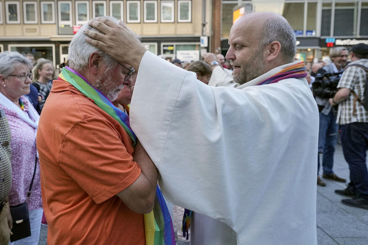Married and same-sex couples take part in a public blessing ceremony in front of the Cologne Cathedral in Germany on Sept. 20, 2023. (Martin Meissner / AP)