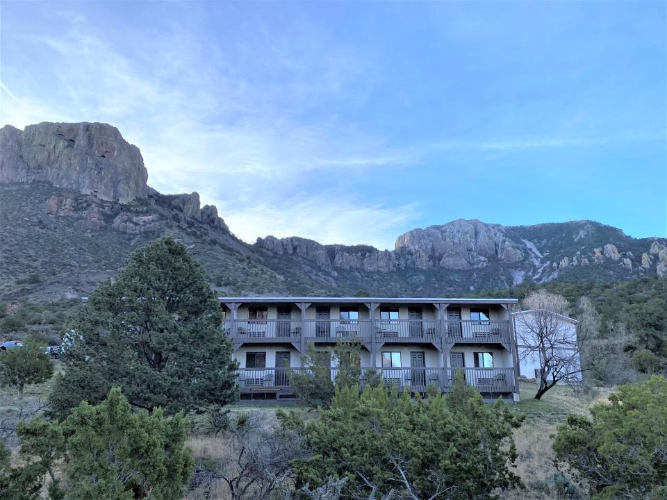 At dusk, guests at Chisos Mountain Lodge in Big Bend National Park, Texas, view majestic sunsets from their balconies. They enjoy easy access to trails weaving through the Chisos Mountains, the southernmost mountain range in the continental United States.