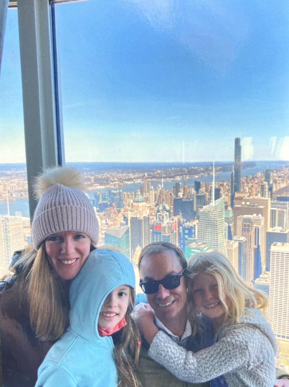 From left to right, Lindsay Gotwald, Samantha Gotwald, Greg Gotwald and Annie Gotwald pose for a photo while on a family vacation in New York city.