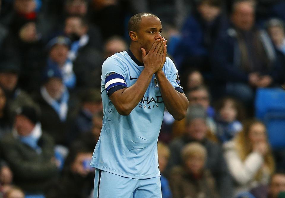 Manchester City's Vincent Kompany reacts during their English FA Cup 4th round soccer match against Middlesbrough at the Etihad Stadium in Manchester, northern England, January 24, 2015. REUTERS/Darren Staples (BRITAIN - Tags: SPORT SOCCER)