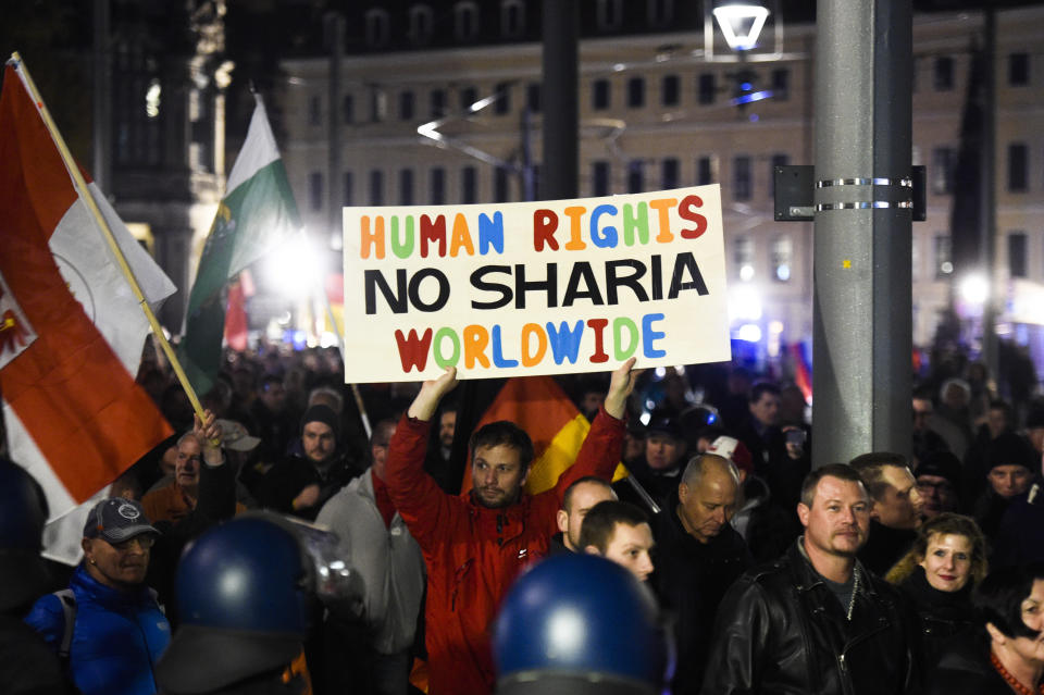 A 2015 march by the German organization PEGIDA (Patriotic Europeans Against the Islamization of the West), one of the increasingly popular groups spreading the idea that white populations are being replaced. (Photo: ASSOCIATED PRESS)