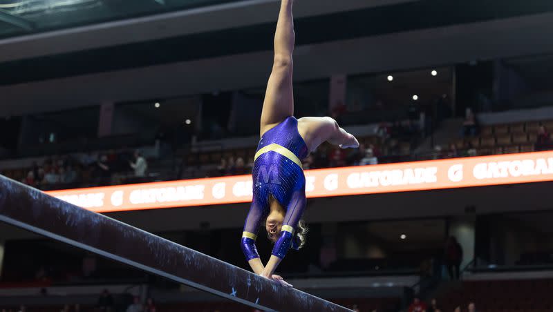 Washington’s Lana Navarro performs her beam routine during the Pac-12 Gymnastics Championships at the Maverik Center in West Valley City on March 18, 2023.