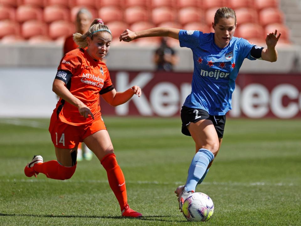 Kealia Watt (right) takes off down the field.