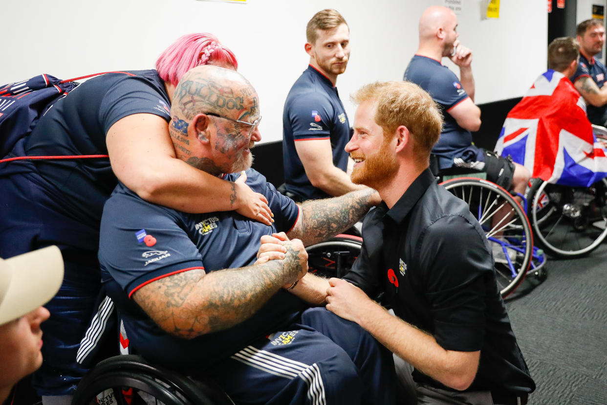 SYDNEY, AUSTRALIA - OCTOBER 27:  Prince Harry, Duke of SussexÊ congratulating Paul Guest aka 'Bear' at the Wheelchair Basketball after United States winning Gold in the finals during day eight of the Invictus Games Sydney 2018 at on October 27, 2018 in Sydney, Australia.  (Photo by Chris Jackson/Getty Images for the Invictus Games Foundation)