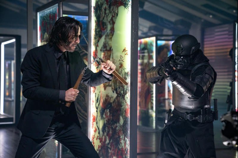 John Wick (Keanu Reeves) faces armored assailants. Photo courtesy of Lionsgate