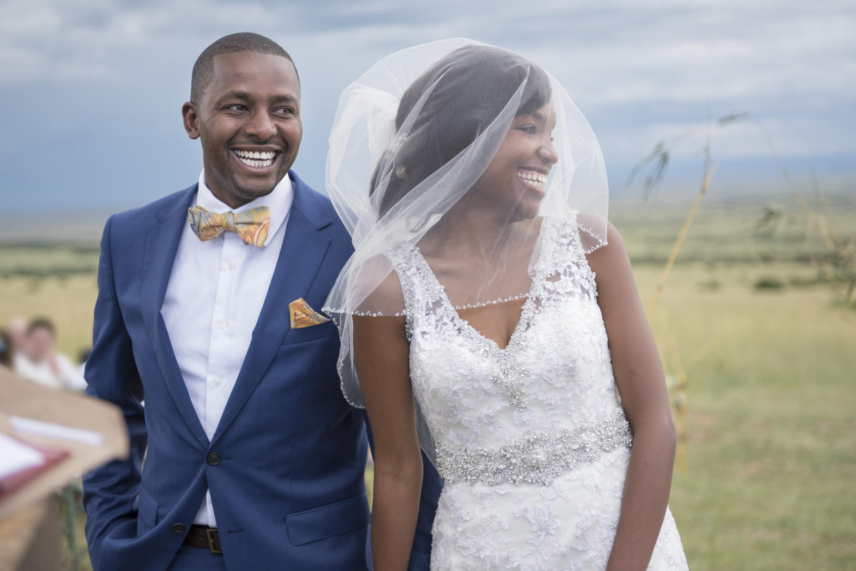 wedding taking place outdoors in Maasai Mara Game Reserve, Kenya